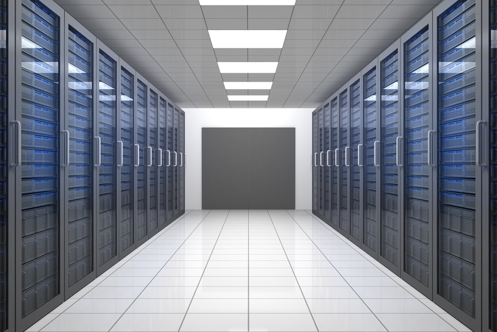 Empty hallway of tower servers in data centre